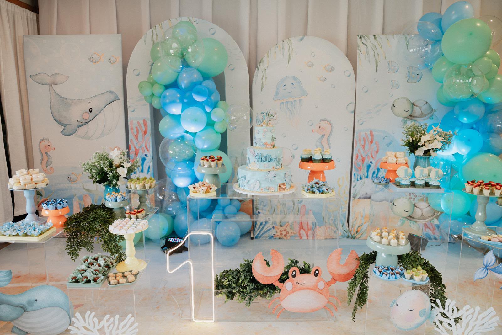 Luxury birthday party setup with balloon garland in Hyannis, Cape Cod